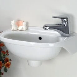 Tina Wall-Mounted Bathroom Sink In White -Master Locks Shop a29ce34979a60f94790485ff5bbdbd0a 1800x1800