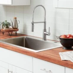 Statham Single-Handle Coil Spring Neck Kitchen Faucet With TurboSpray And FastMount In Stainless Steel 12 Statham Single-Handle Coil Spring Neck Kitchen Faucet With TurboSpray And FastMount In Stainless Steel -Master Locks Shop cd92d4e6c47a4ed26b6fb863bac254c0 1800x1800