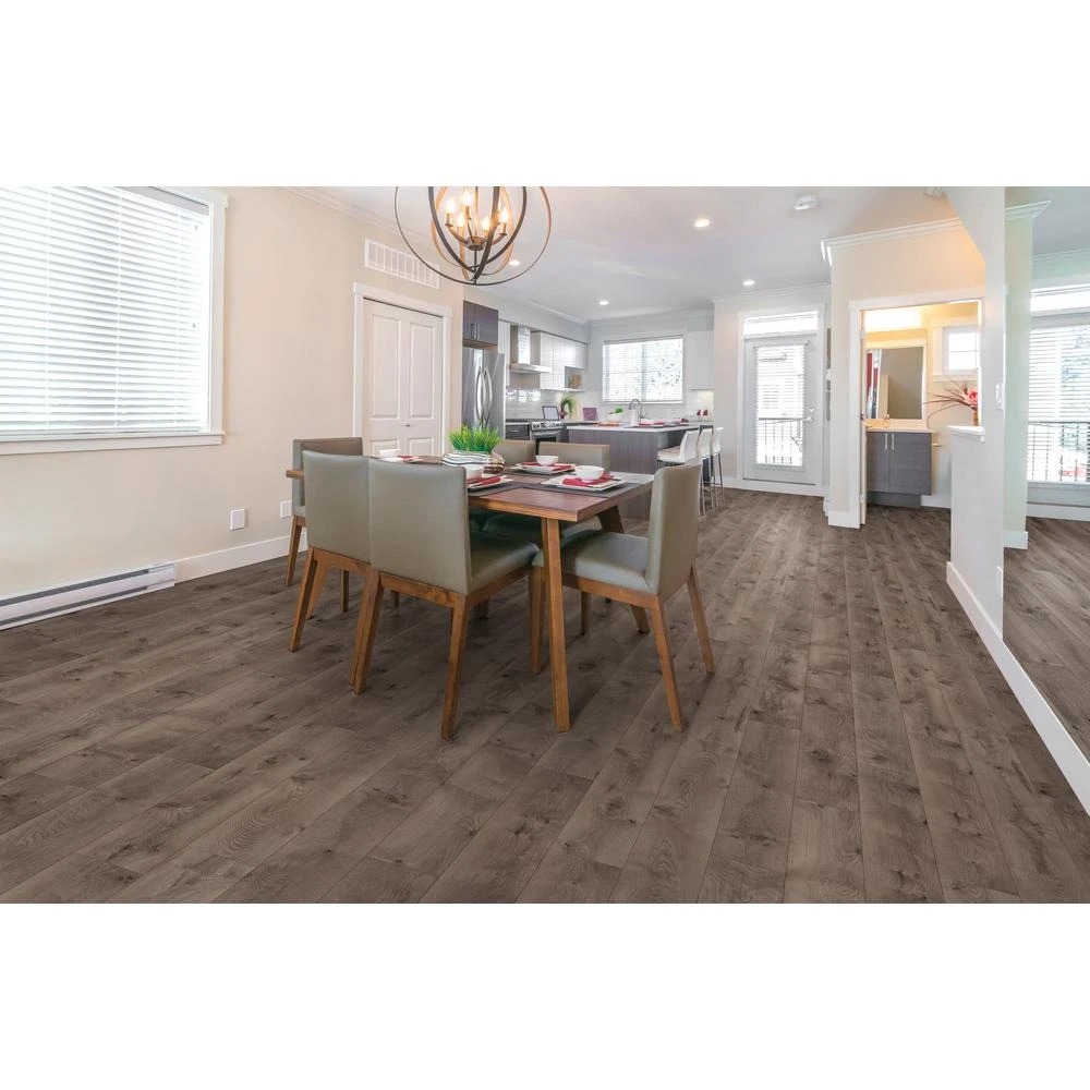 TrafficMASTER Anniston Oak 7 Mm Thick X 7-2/3 In. Wide X 50-5/8 In. Length Laminate Flooring (1063.48 Sq. Ft. / Pallet) 4 TrafficMASTER Anniston Oak 7 Mm Thick X 7-2/3 In. Wide X 50-5/8 In. Length Laminate Flooring (1063.48 Sq. Ft. / Pallet) - Image 2